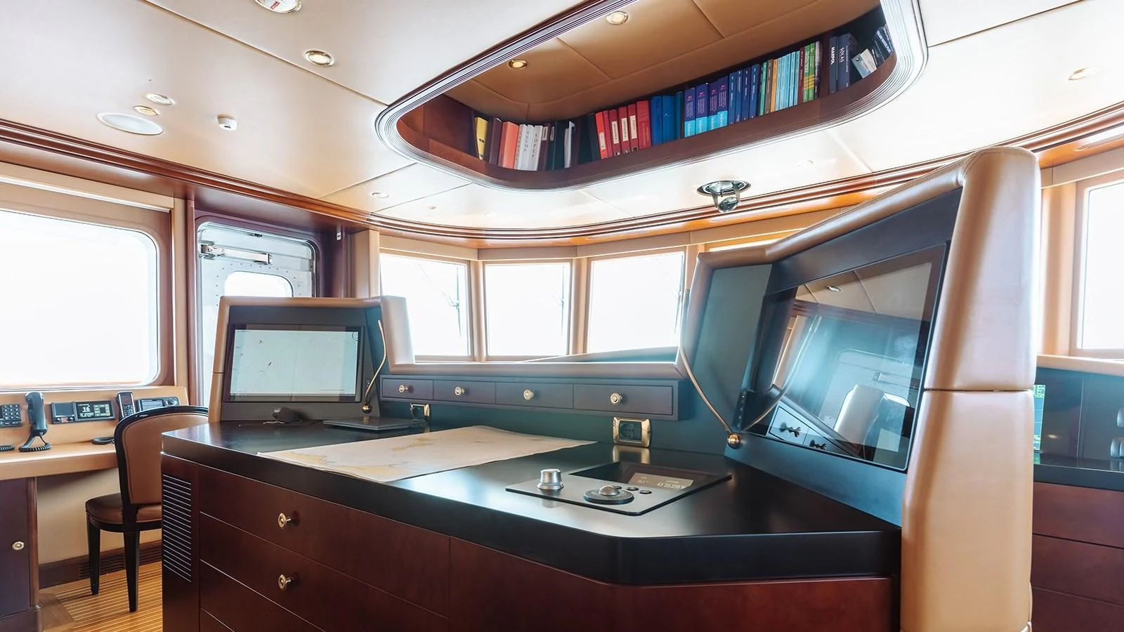 a computer on a desk aboard INCAL Yacht for Sale