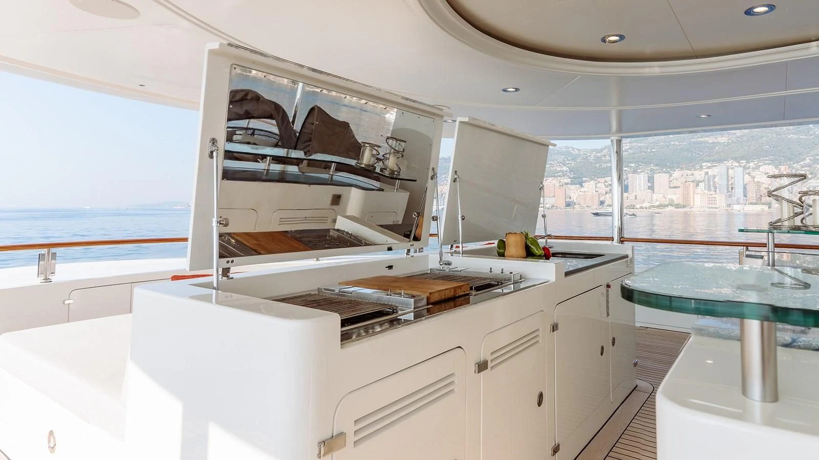 a kitchen with white cabinets aboard INCAL Yacht for Sale