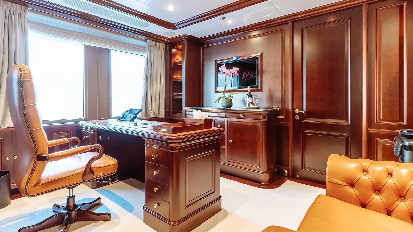a kitchen with a large island aboard INCAL Yacht for Sale