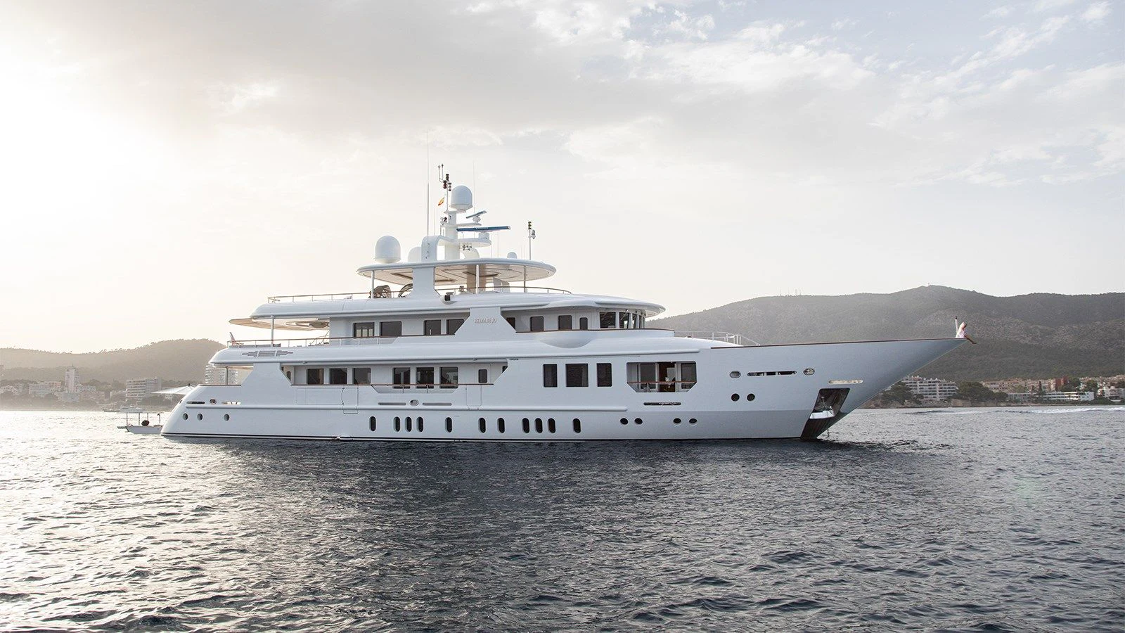 a large white ship aboard INCAL Yacht for Sale