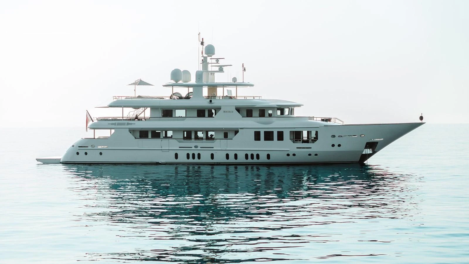 a large white boat aboard INCAL Yacht for Sale