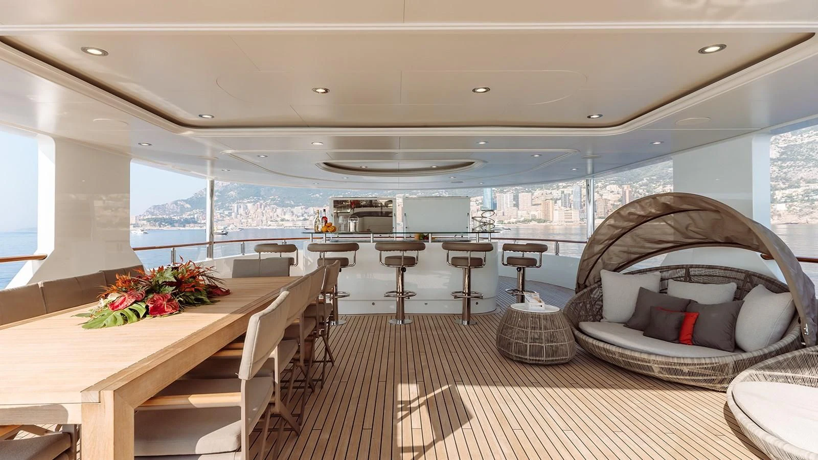 a room with a table and chairs aboard INCAL Yacht for Sale