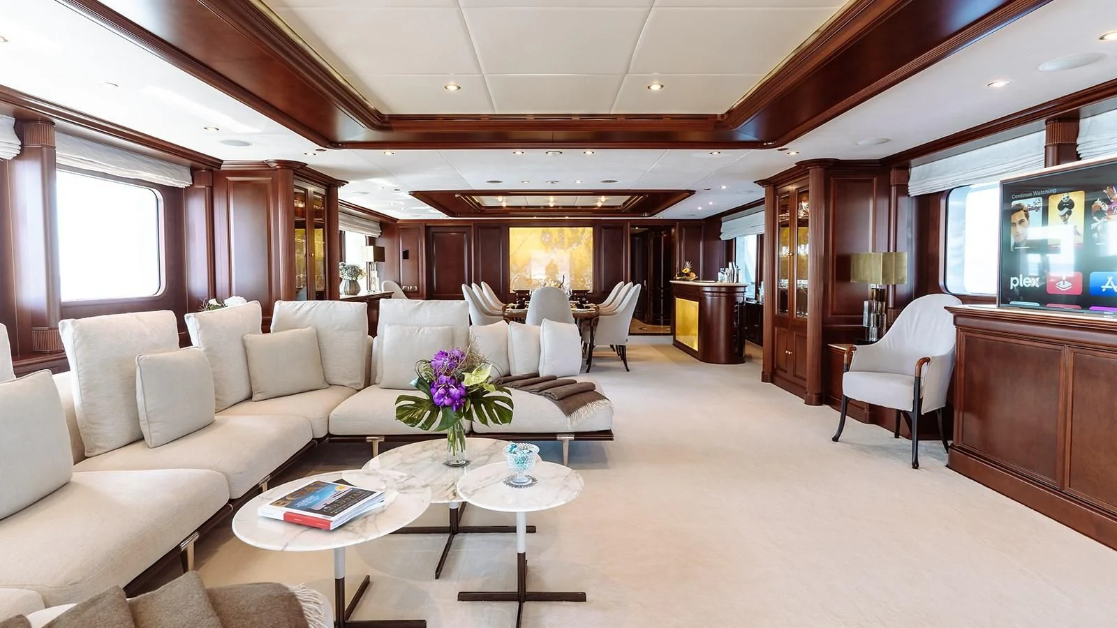 a living room with a large screen aboard INCAL Yacht for Sale