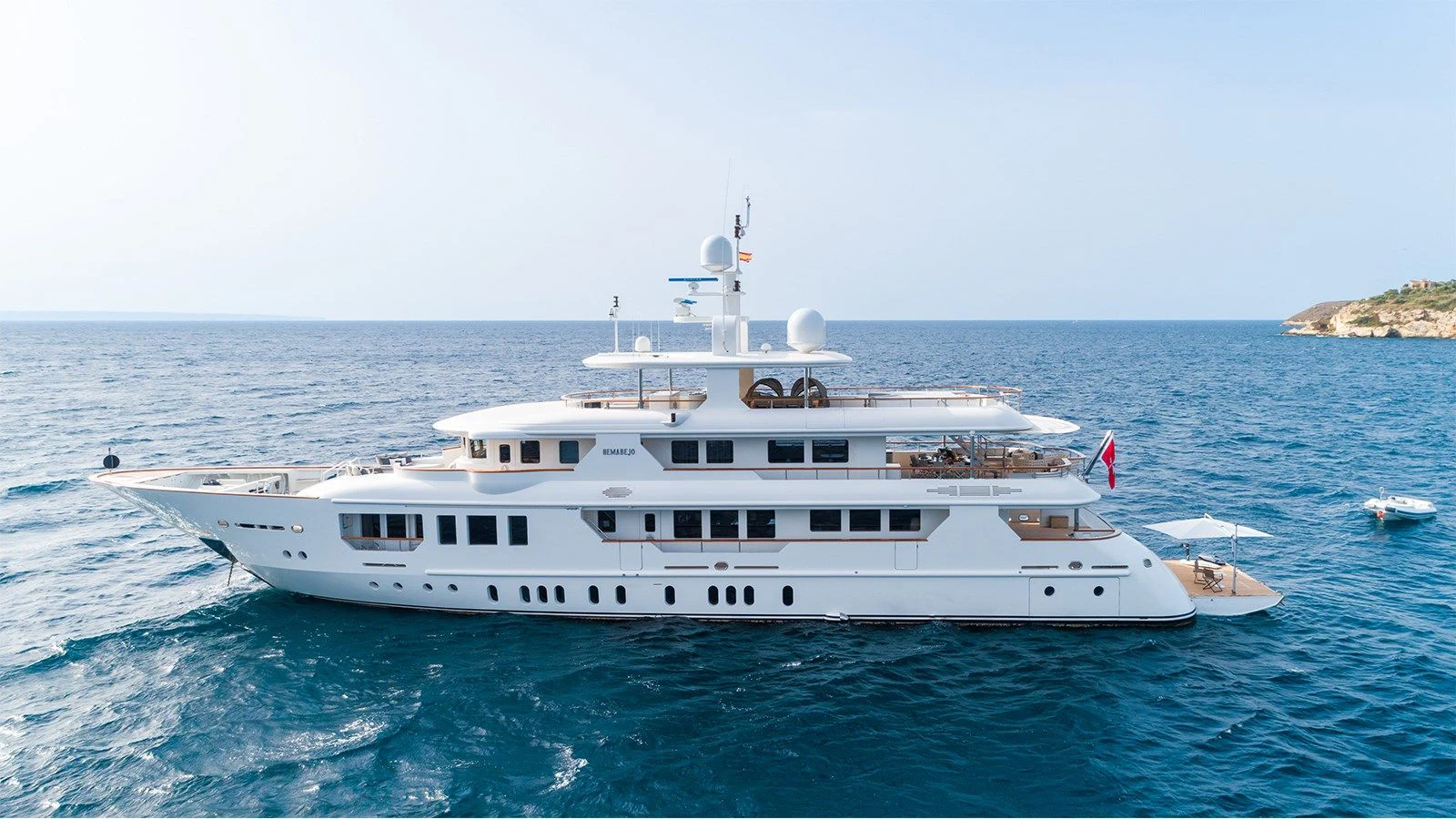 a large white boat in the water aboard INCAL Yacht for Sale