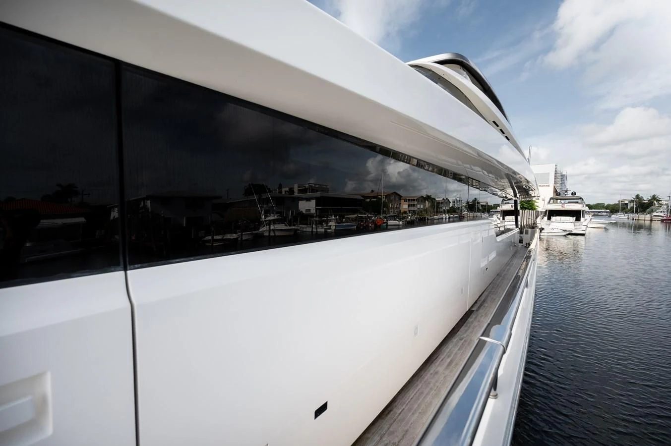 a large white boat on a body of water aboard ASTONISH Yacht for Sale