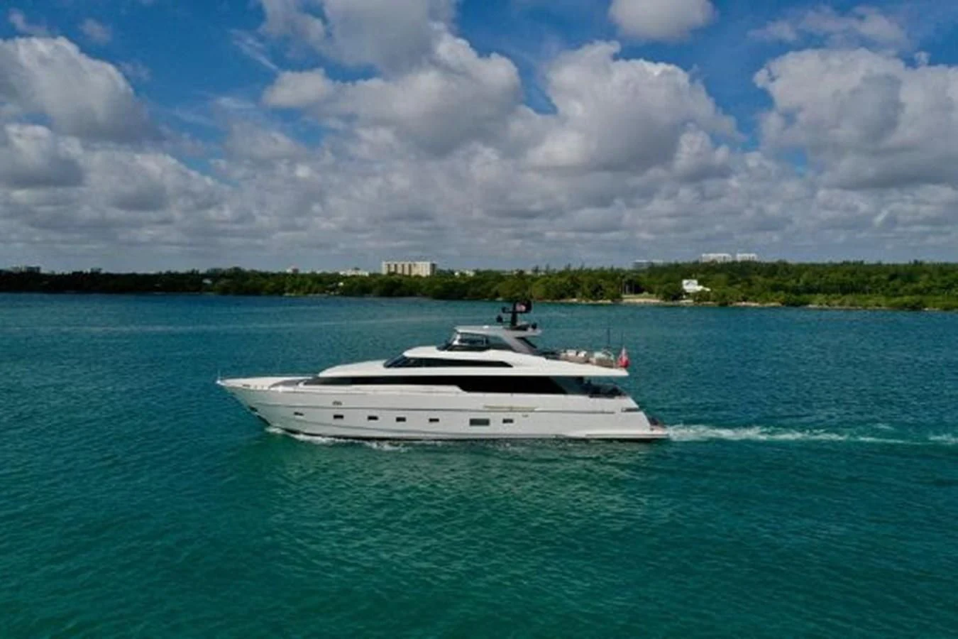 a white boat on the water aboard ASTONISH Yacht for Sale