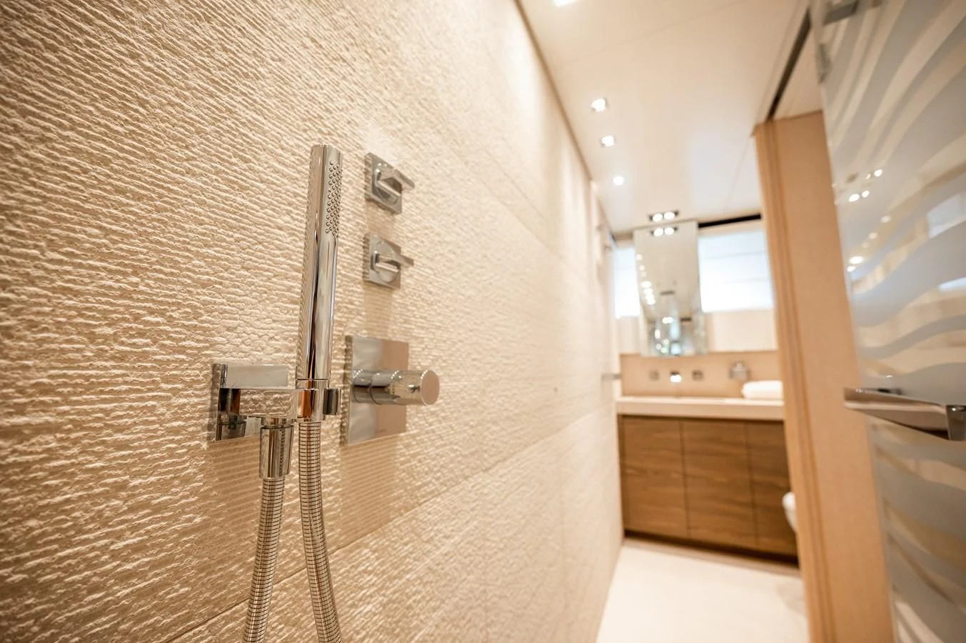 a bathroom with a shower unit aboard ASTONISH Yacht for Sale