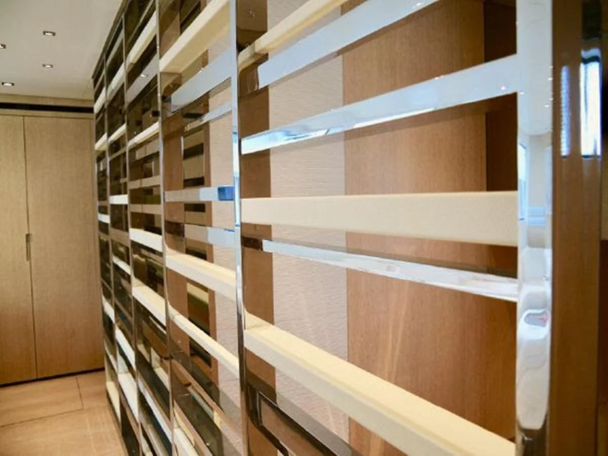 a room with shelves aboard ASTONISH Yacht for Sale
