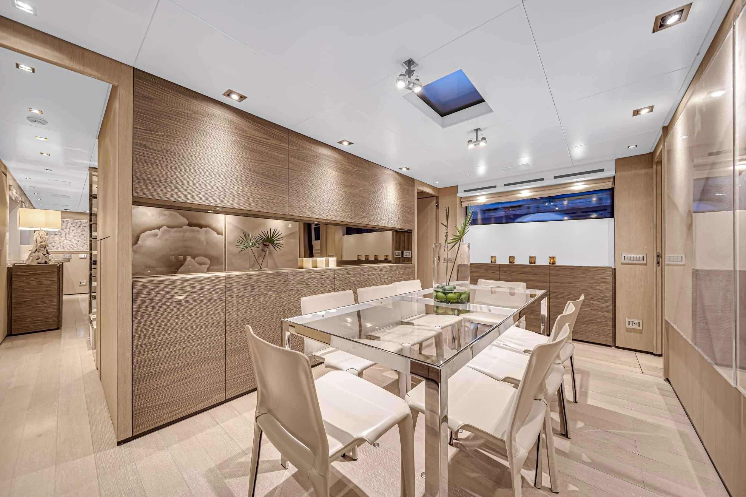 a large kitchen with a dining table aboard ASTONISH Yacht for Sale