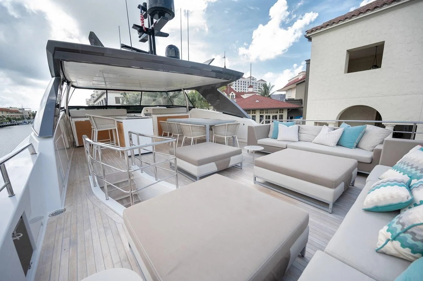 a deck with a couch and a chair on it aboard ASTONISH Yacht for Sale