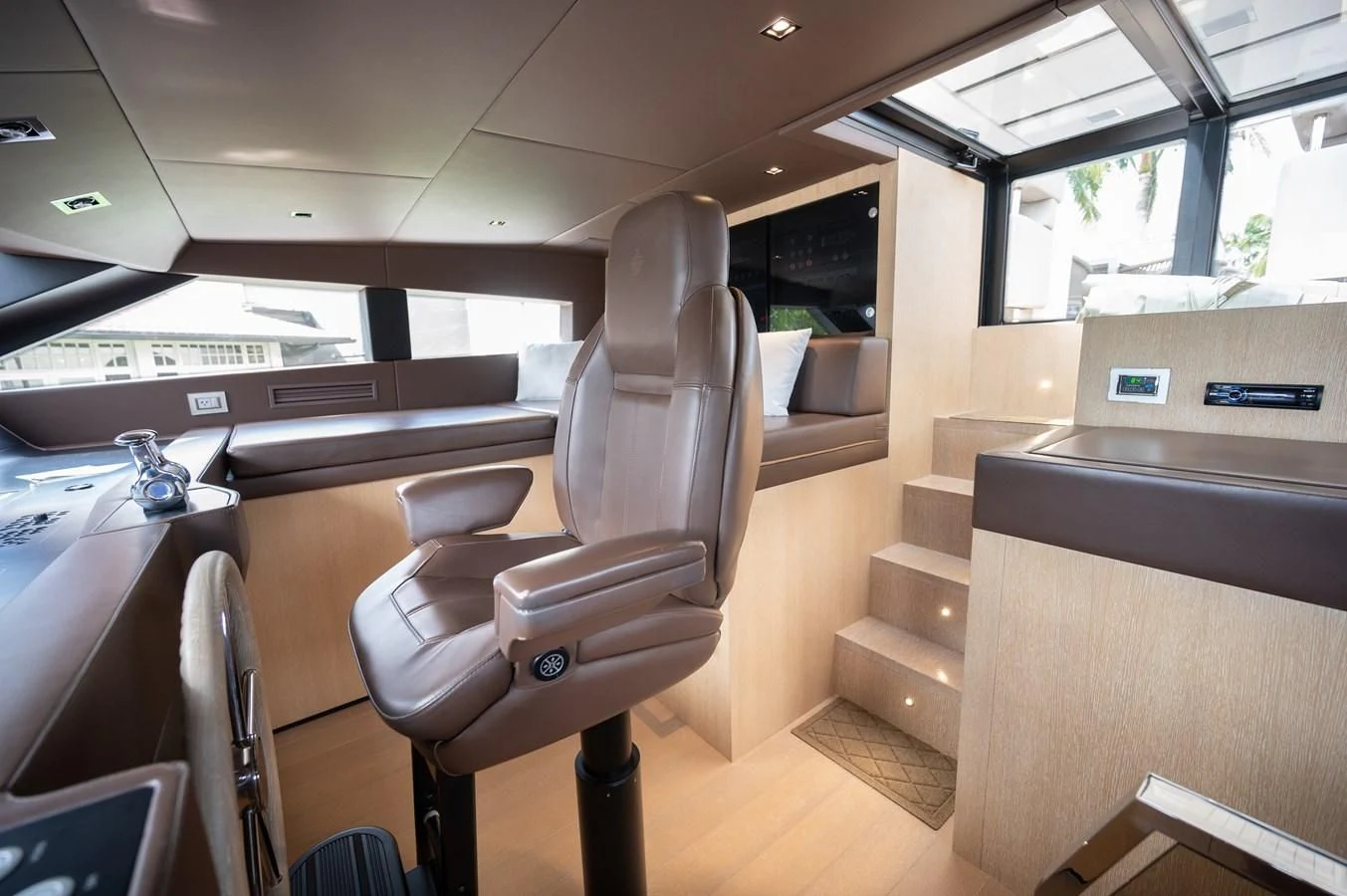 a room with chairs and a bench aboard ASTONISH Yacht for Sale