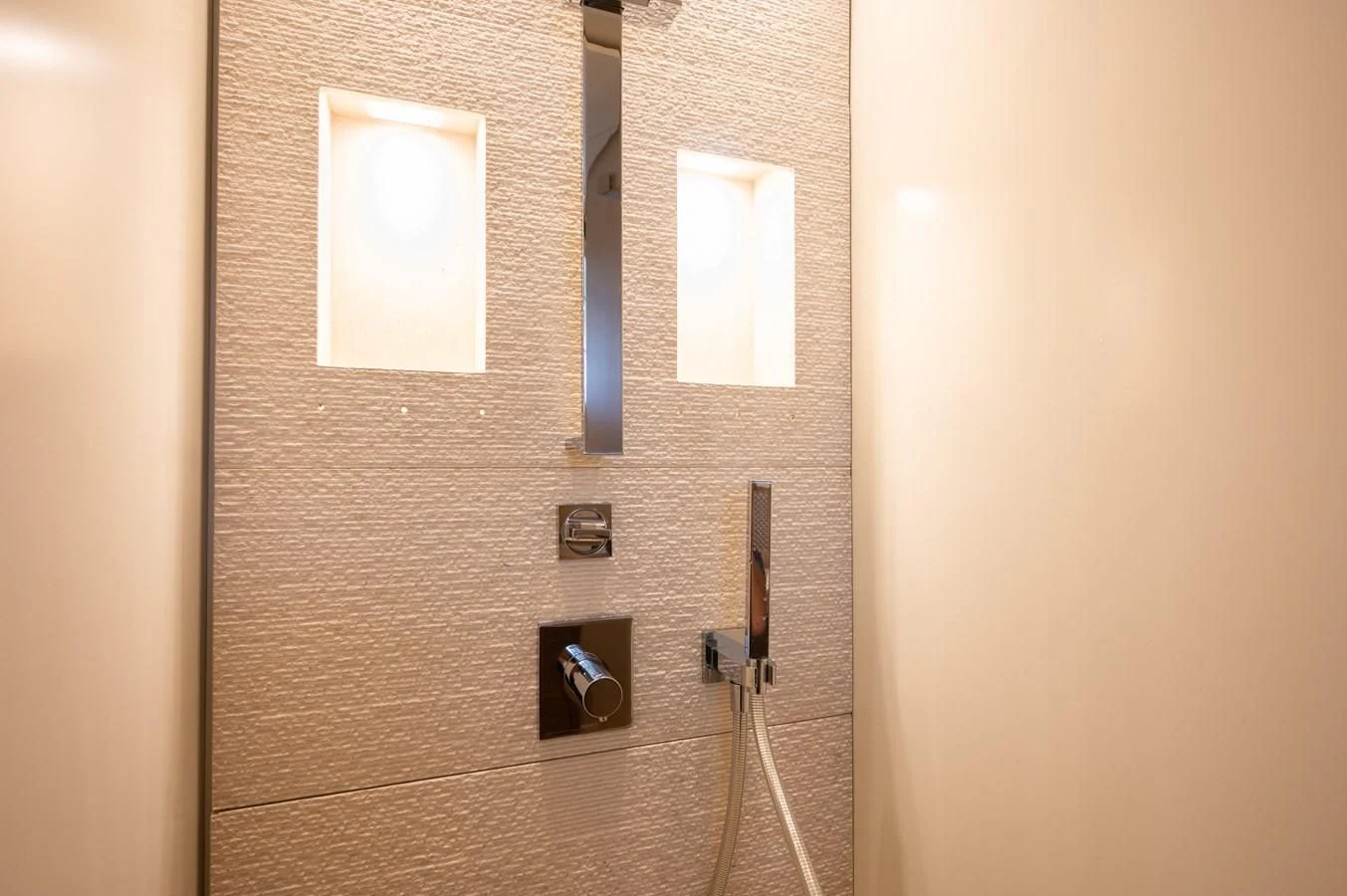 a white wall with a light switch aboard ASTONISH Yacht for Sale