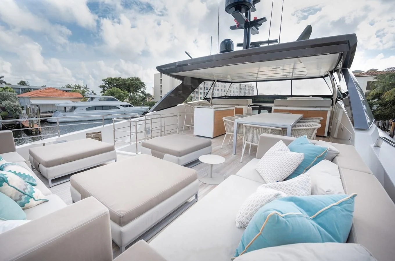 a large white lounge chair in a room with a large white roof aboard ASTONISH Yacht for Sale