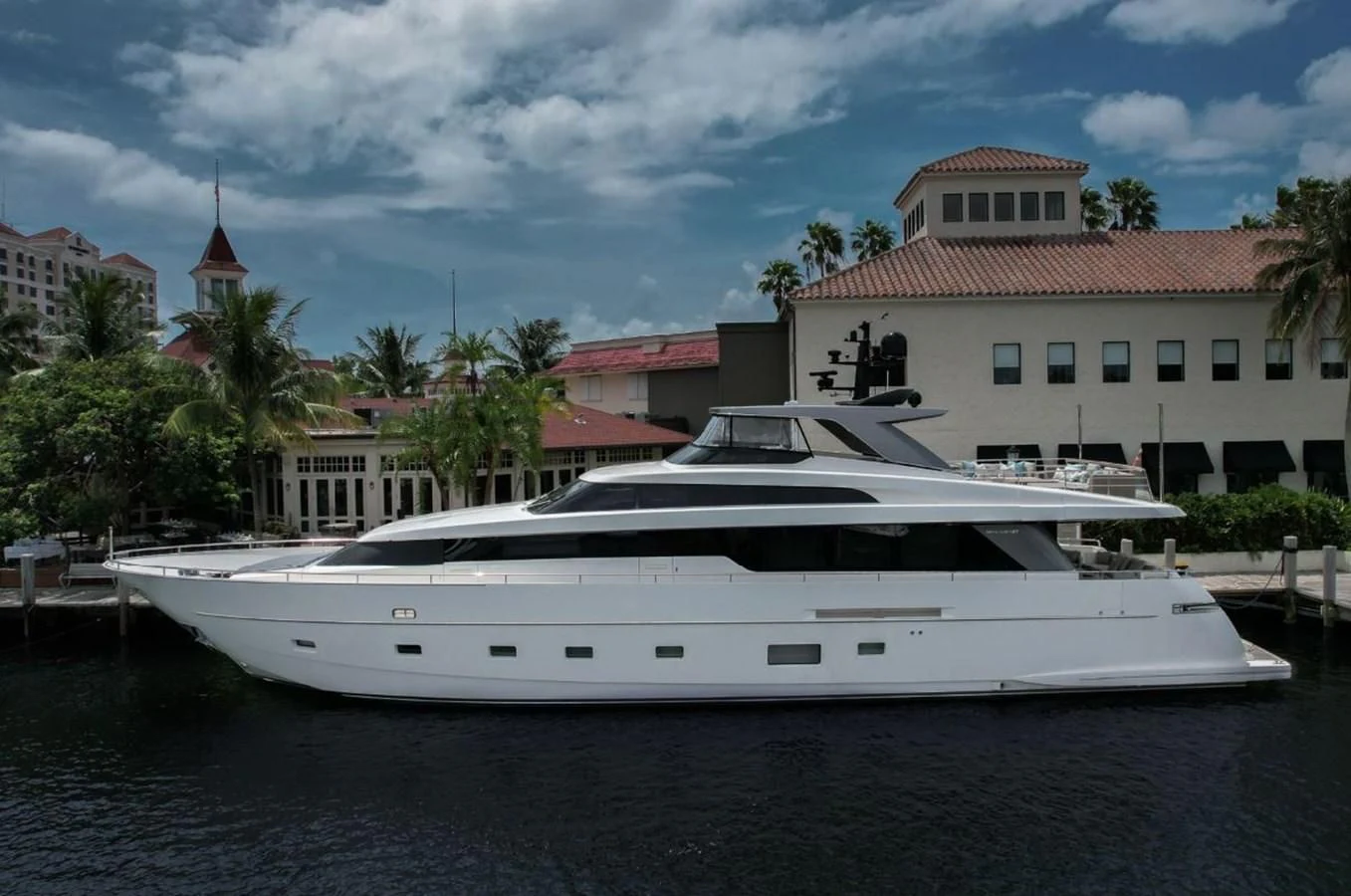 a white yacht in the water aboard ASTONISH Yacht for Sale