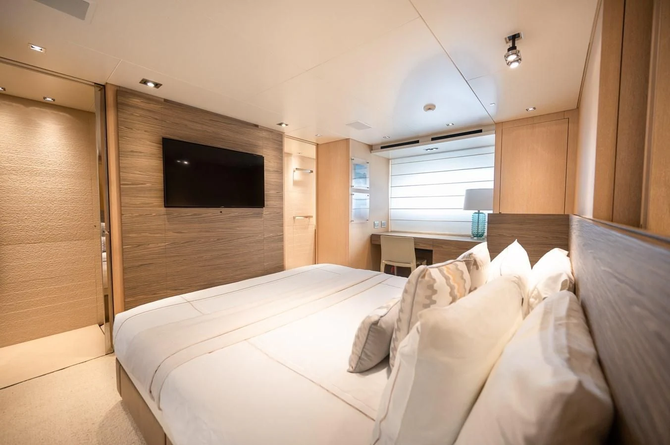 a bed in a room aboard ASTONISH Yacht for Sale