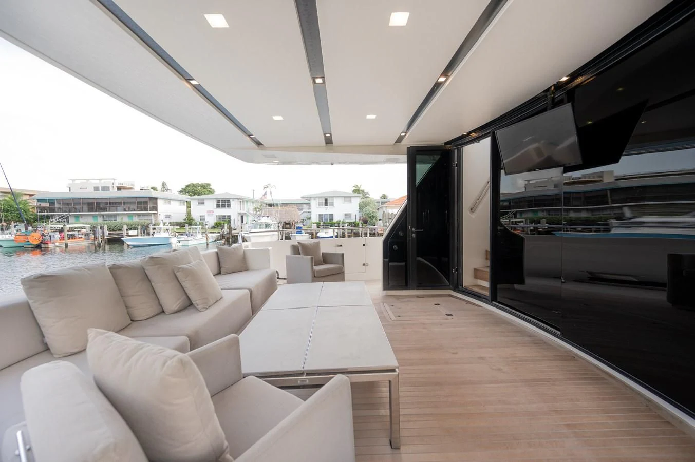 a living room with a large window aboard ASTONISH Yacht for Sale