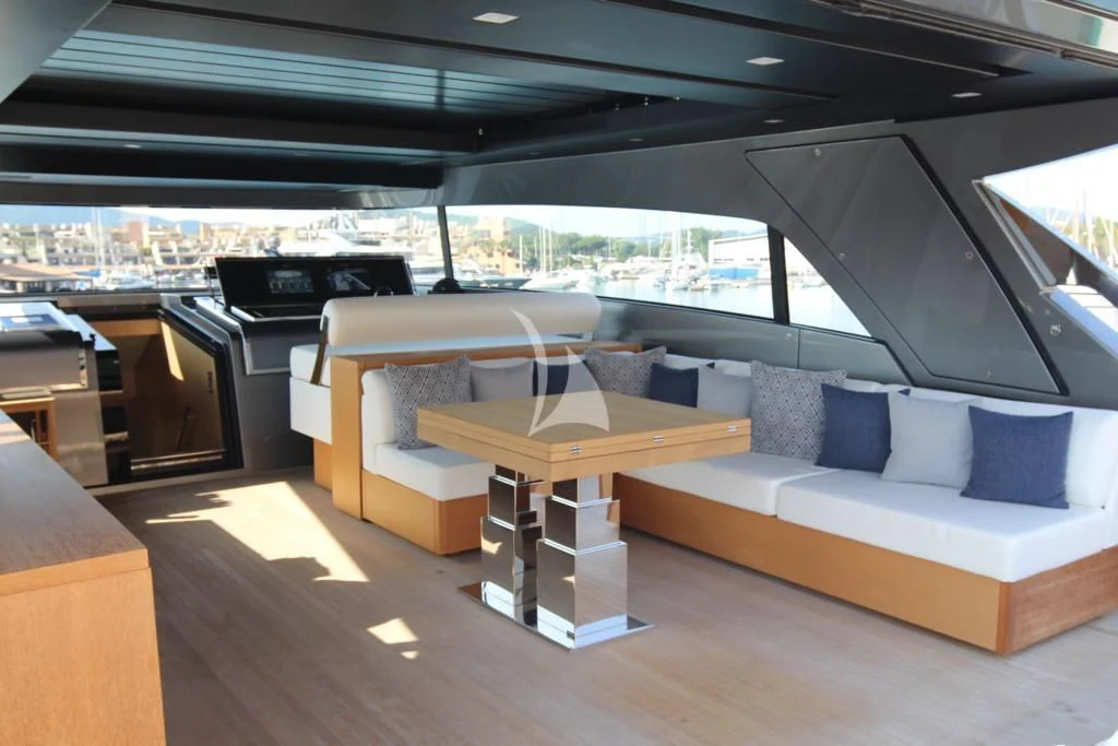a room with a couch and a table aboard BELLE DE NUIT Yacht for Sale