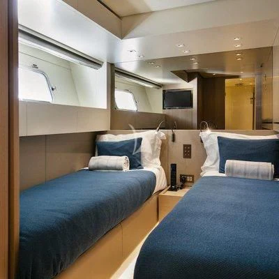 a room with two beds aboard BELLE DE NUIT Yacht for Sale