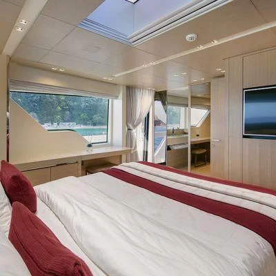a bed in a room aboard BELLE DE NUIT Yacht for Sale