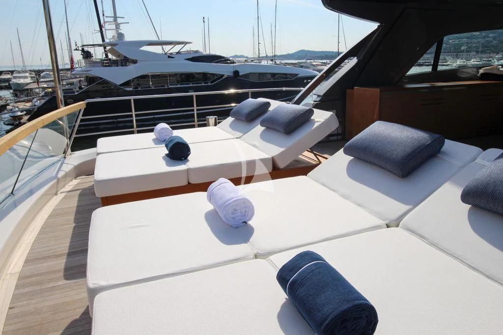 a large white boat with a black pillow on it aboard BELLE DE NUIT Yacht for Sale