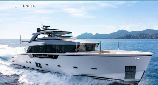 a white yacht on the water aboard BELLE DE NUIT Yacht for Sale