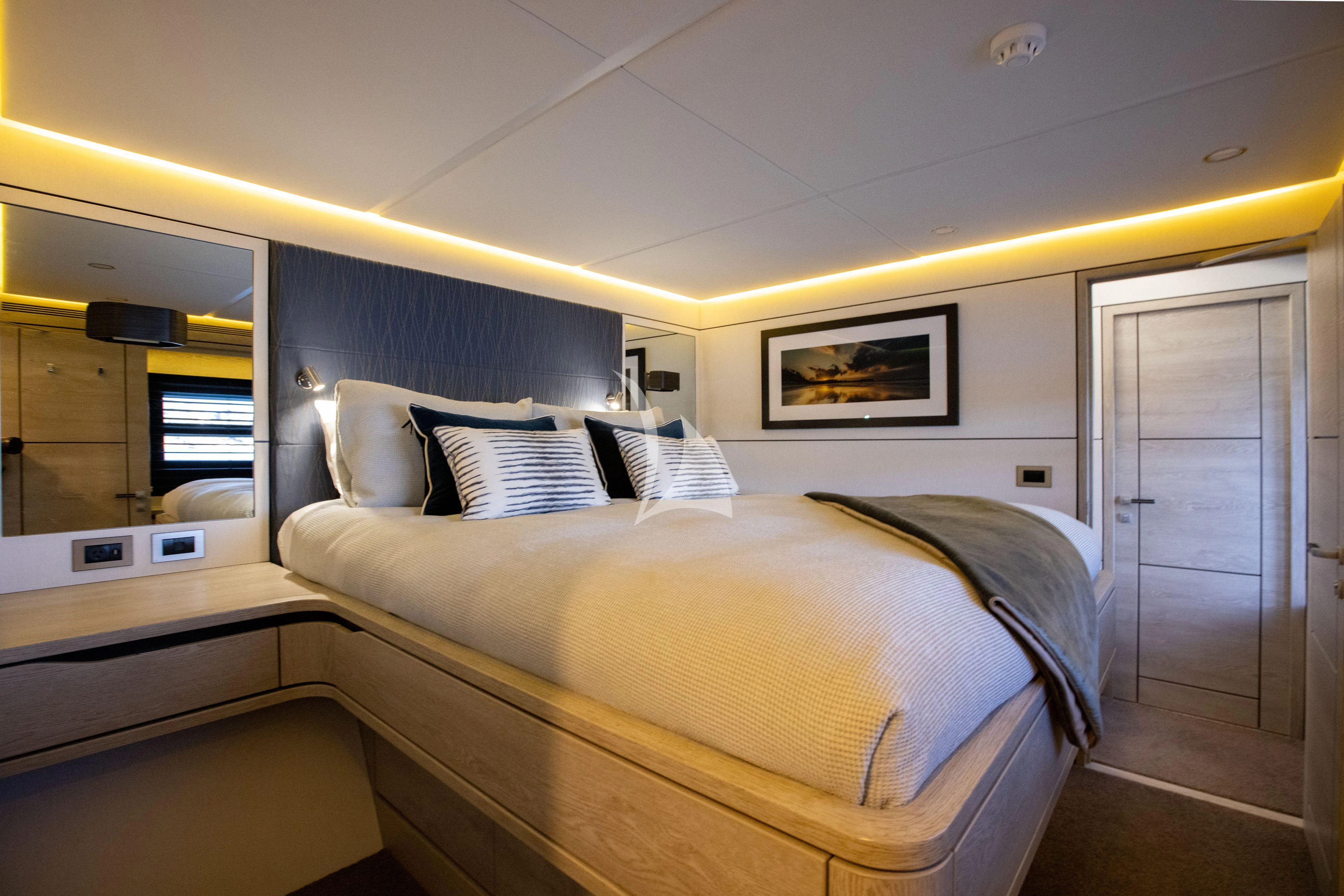 a room with two beds aboard RUA MOANA Yacht for Sale