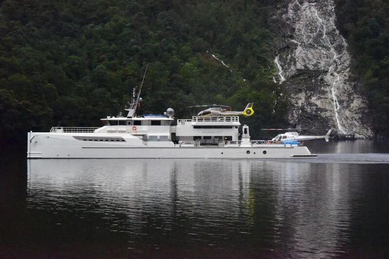 a boat on the water aboard PURSUIT Yacht for Sale