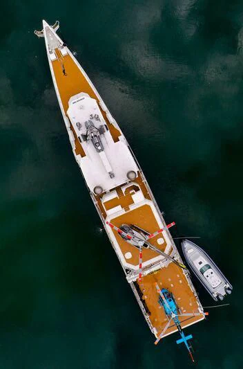 a yellow boat in the water aboard PURSUIT Yacht for Sale