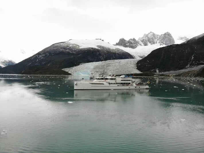 a boat on a lake aboard PURSUIT Yacht for Sale