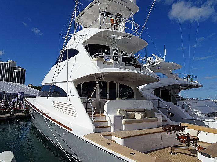 a white yacht docked aboard MAVERICK Yacht for Sale