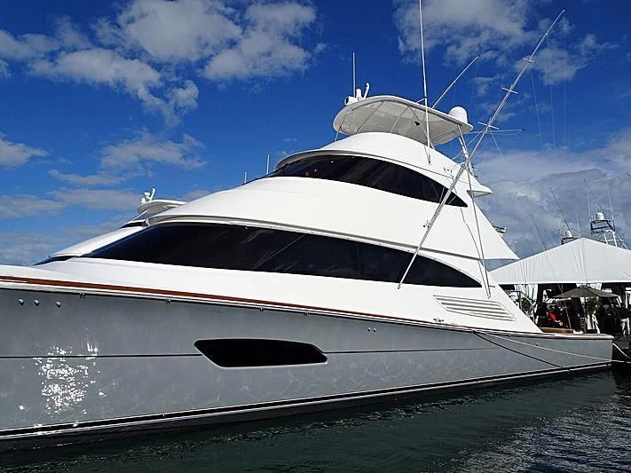 a white yacht on the water aboard MAVERICK Yacht for Sale