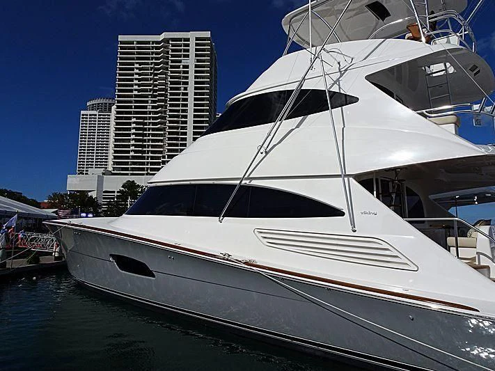 a white yacht docked aboard MAVERICK Yacht for Sale