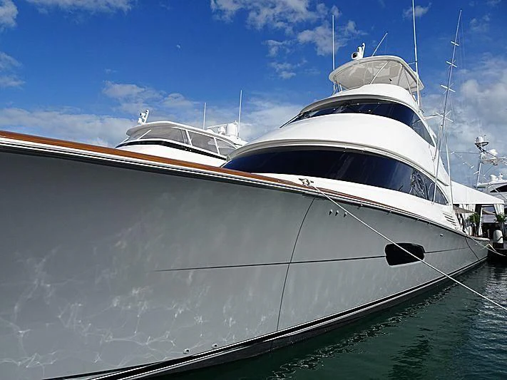 a white yacht in the water aboard MAVERICK Yacht for Sale