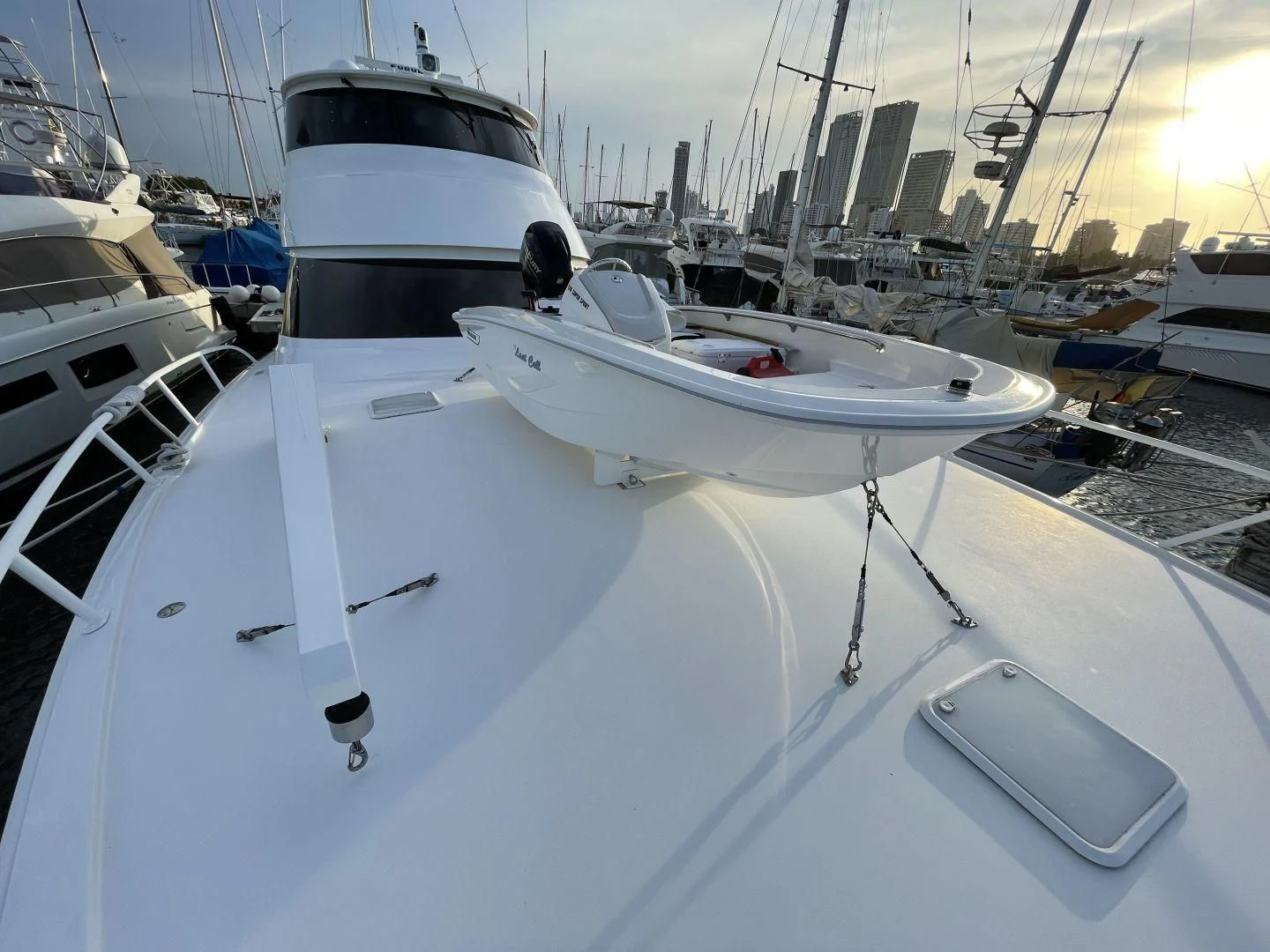 a group of boats in a harbor aboard LAST CALL Yacht for Sale