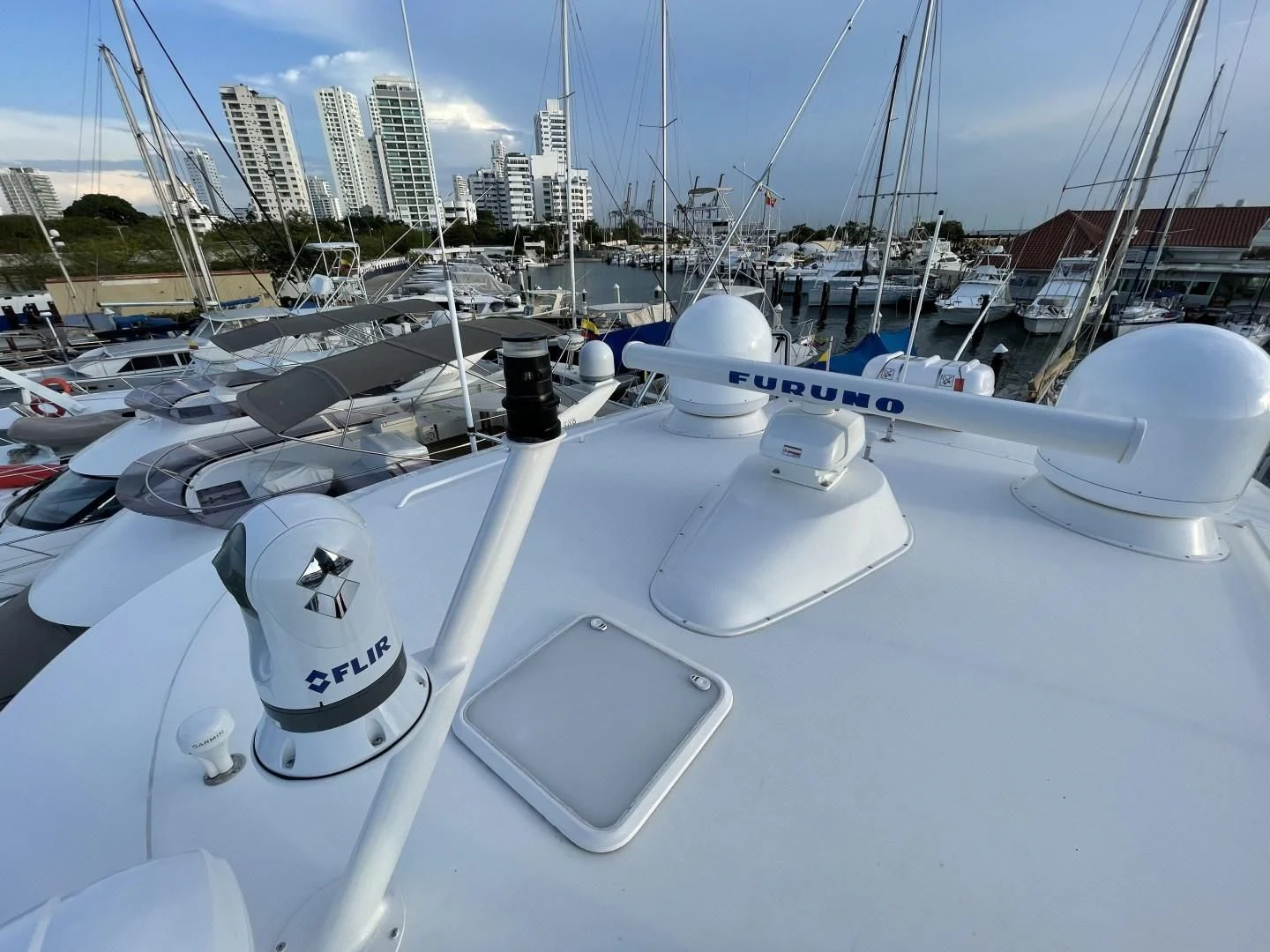 a group of boats in a harbor aboard LAST CALL Yacht for Sale