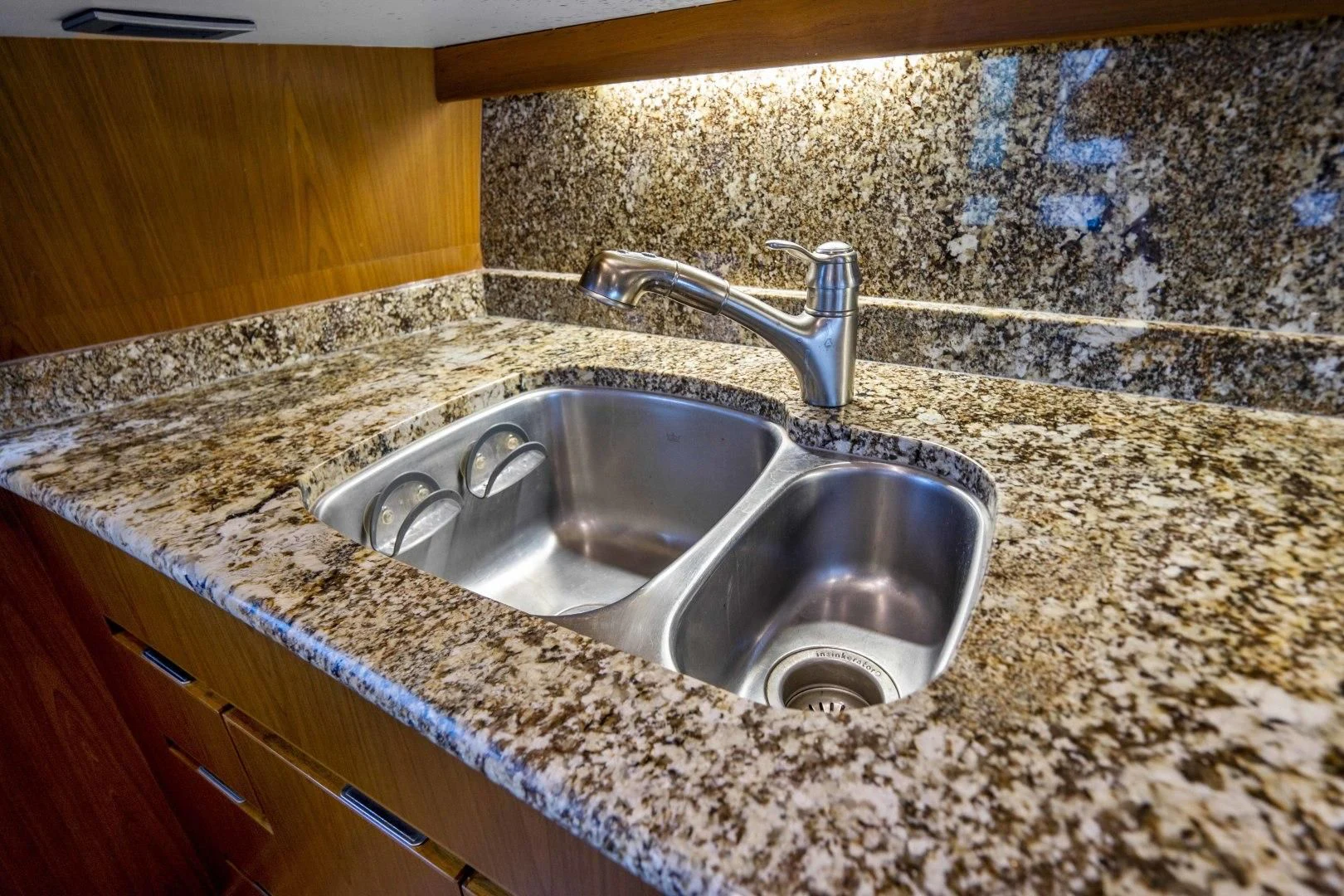 a sink in a kitchen aboard LAST CALL Yacht for Sale