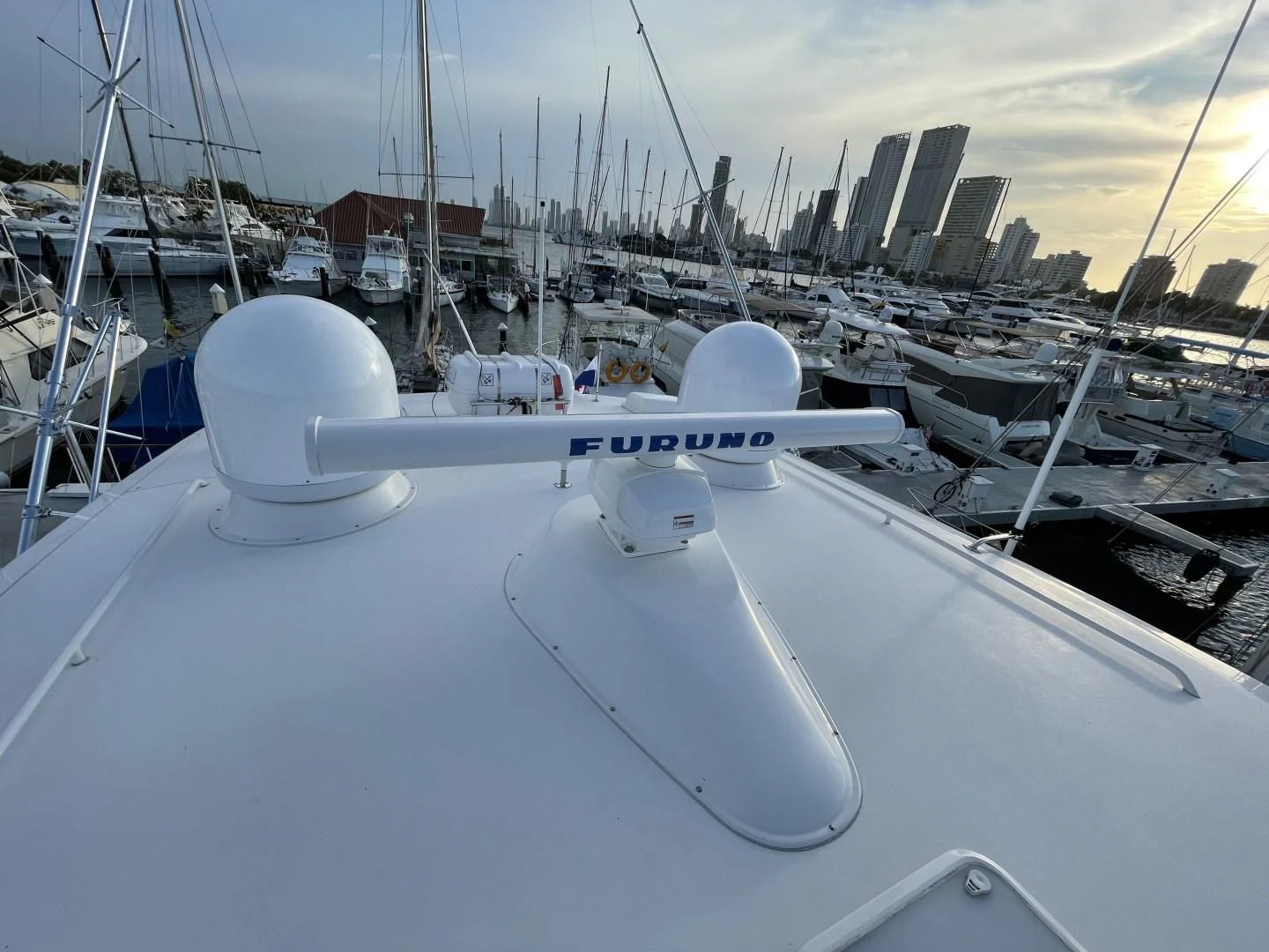 a row of white boats aboard LAST CALL Yacht for Sale