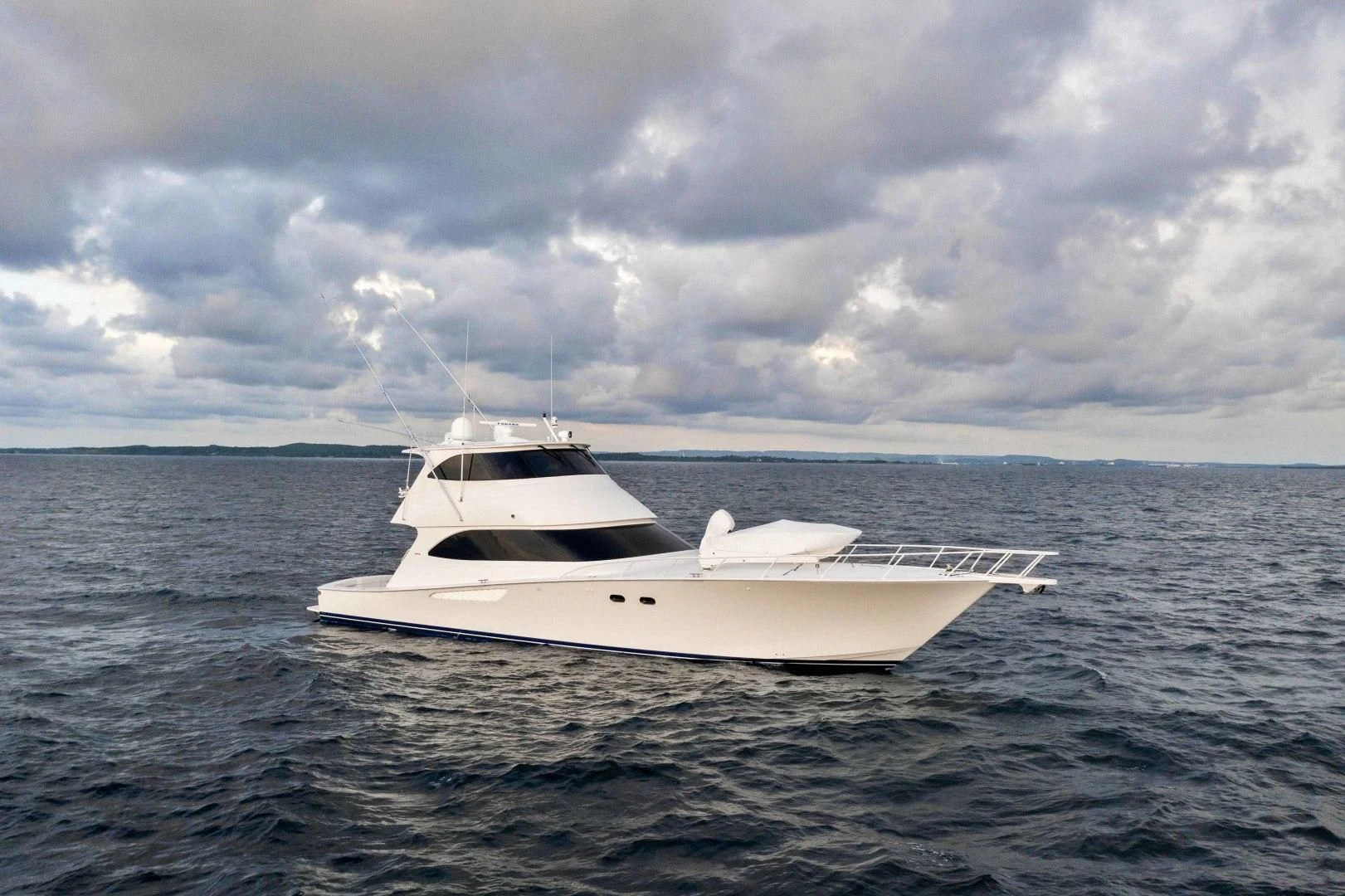 a white yacht in the water aboard LAST CALL Yacht for Sale