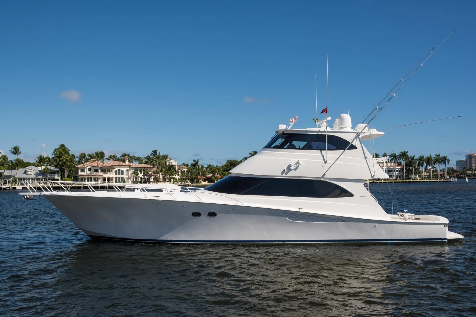 a white yacht on the water aboard LAST CALL Yacht for Sale