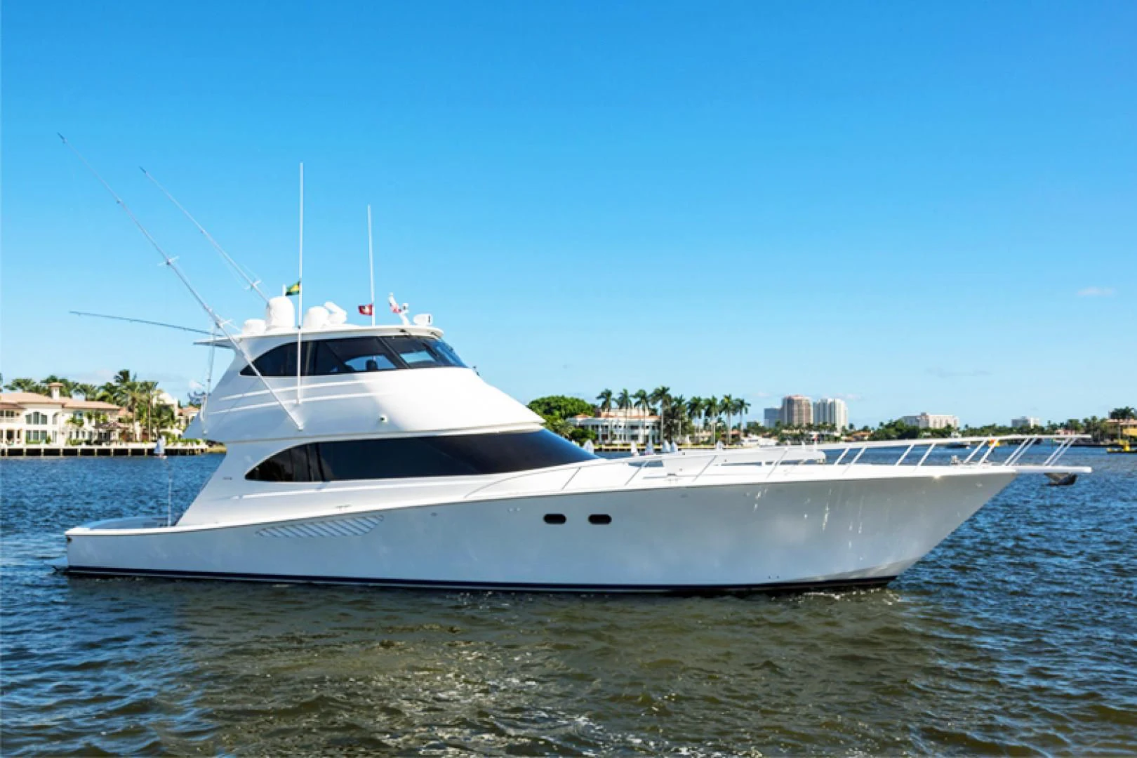 a white yacht in the water aboard LAST CALL Yacht for Sale