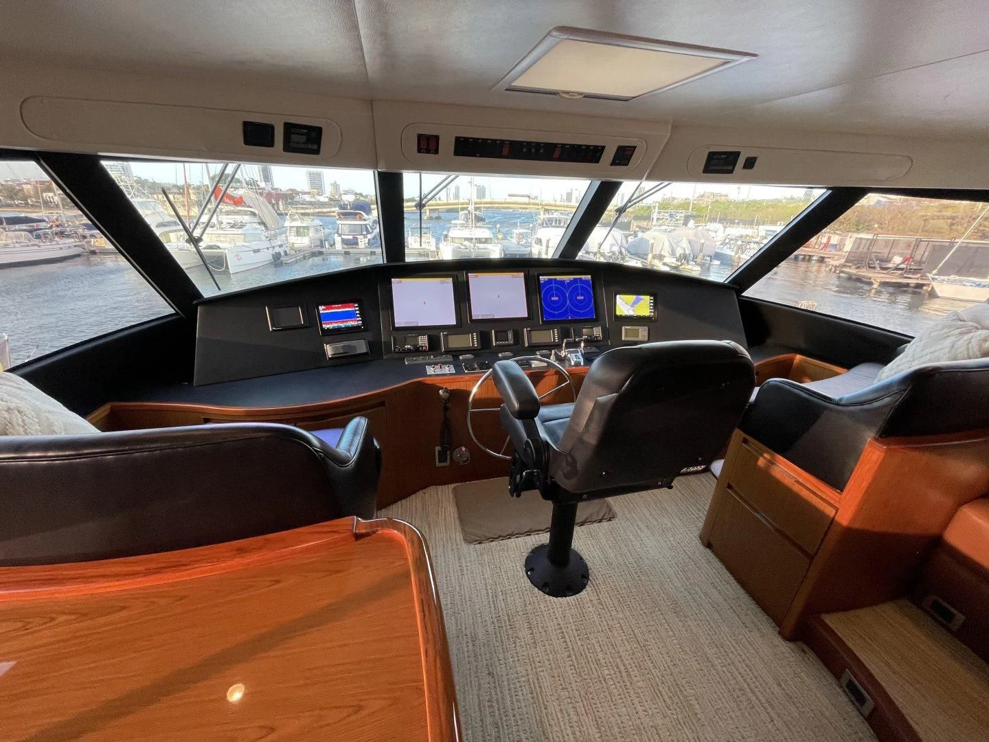 inside of a vehicle with screens aboard LAST CALL Yacht for Sale