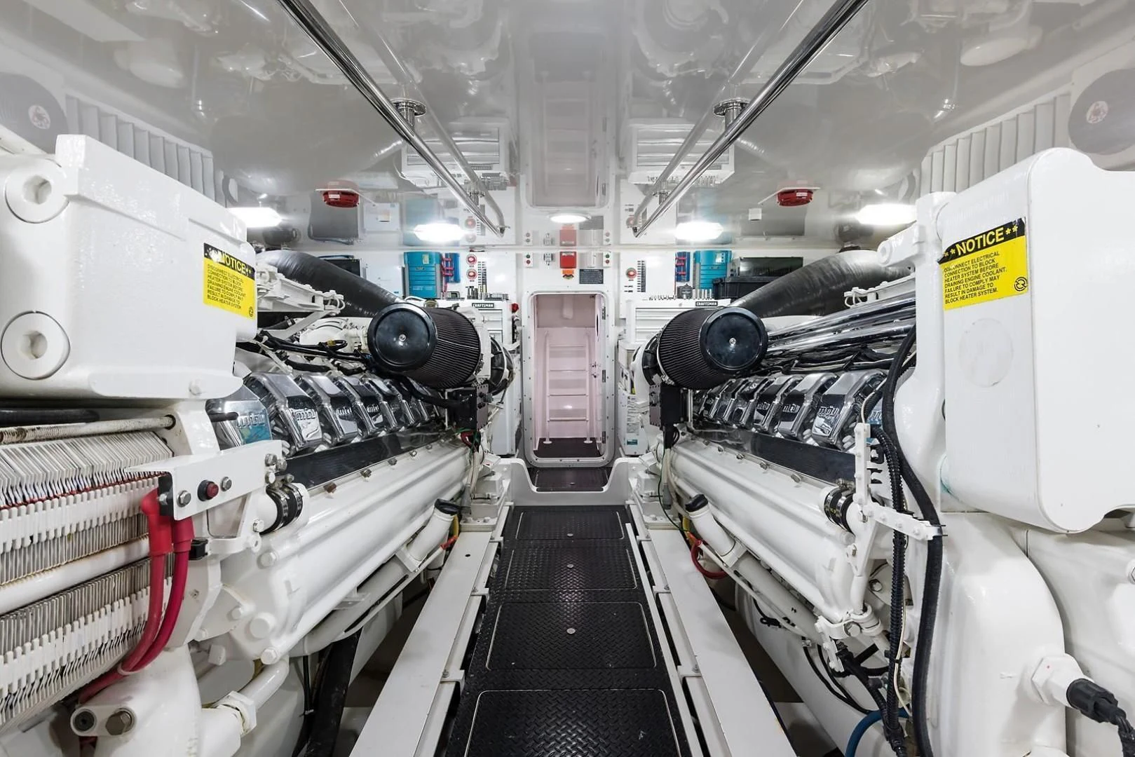 a large white machine with black tubes aboard LAST CALL Yacht for Sale