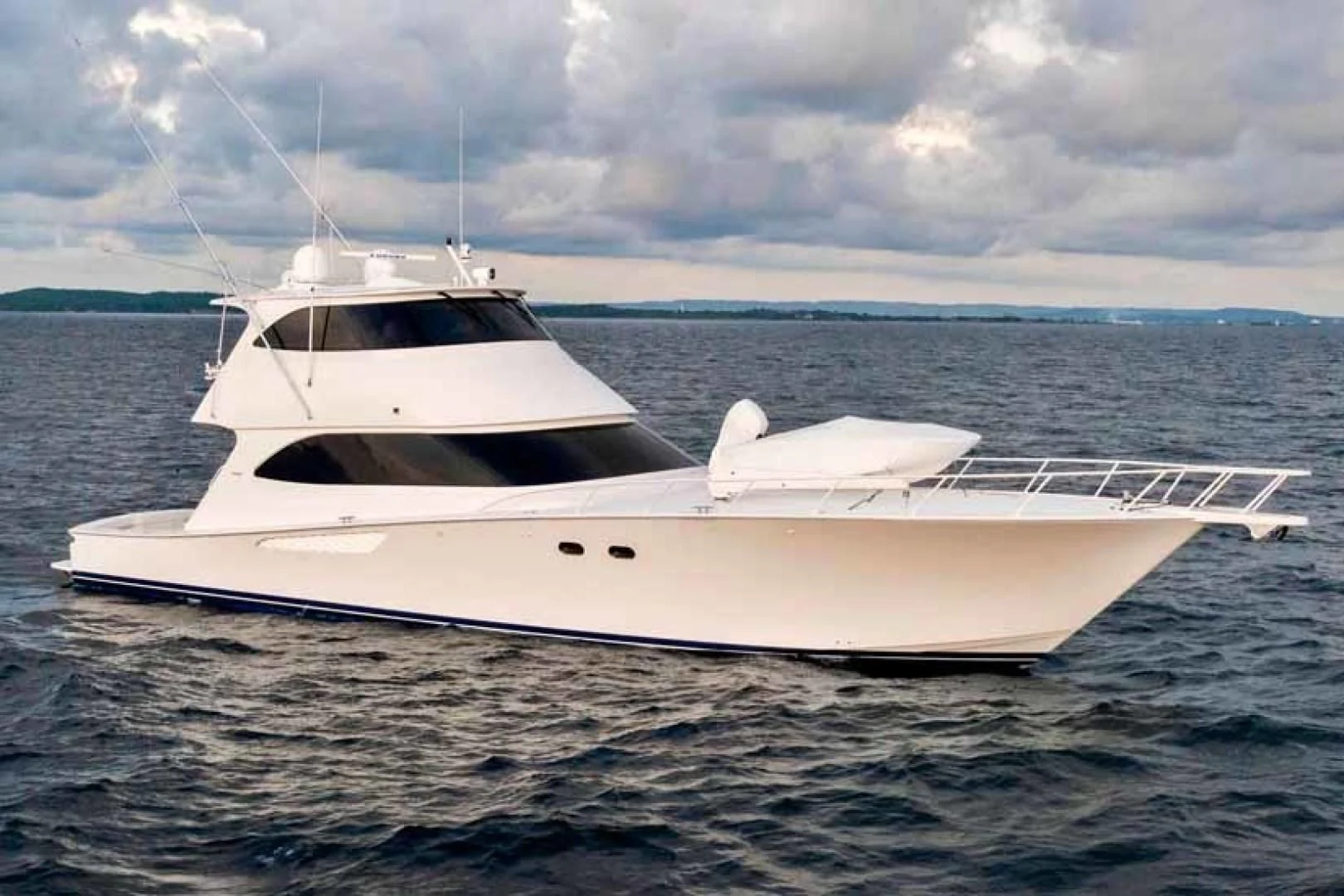 a white yacht in the water aboard LAST CALL Yacht for Sale