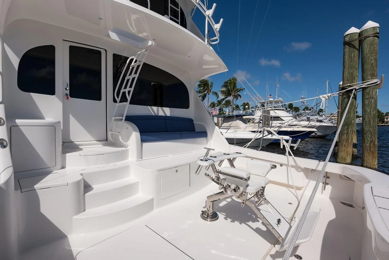 a white boat on the water aboard LAST CALL Yacht for Sale
