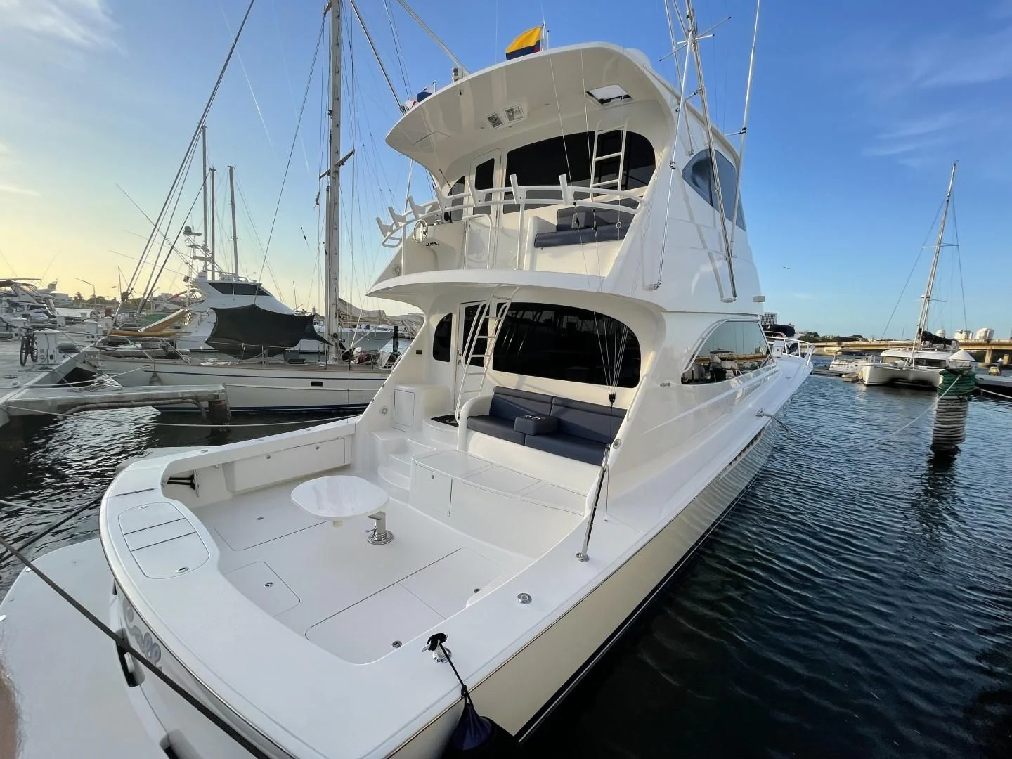 a white boat in the water aboard LAST CALL Yacht for Sale