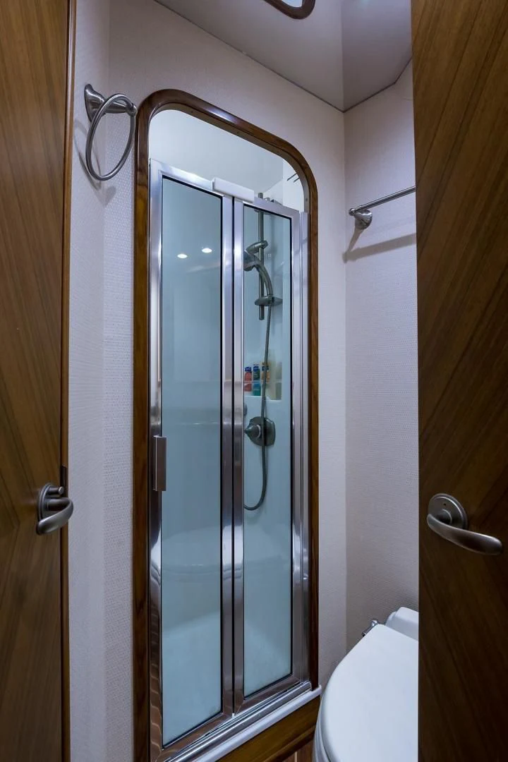 a shower unit in a bathroom aboard LAST CALL Yacht for Sale