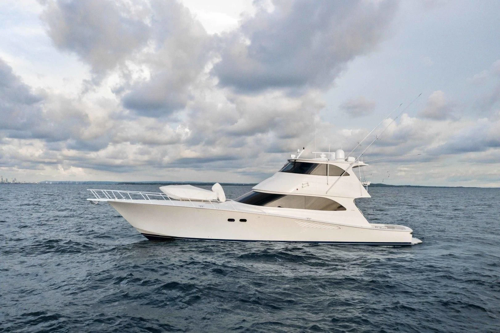 a white yacht in the water aboard LAST CALL Yacht for Sale