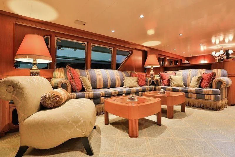 a living room with a couch and a coffee table aboard NORDIC STAR Yacht for Sale