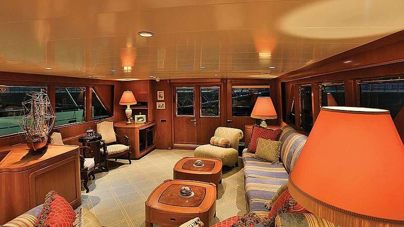 a living room with a couch and a table aboard NORDIC STAR Yacht for Sale