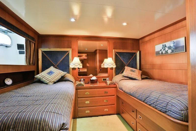 a bedroom with two beds aboard NORDIC STAR Yacht for Sale